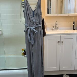 French Connection blue striped jumpsuit in size 2